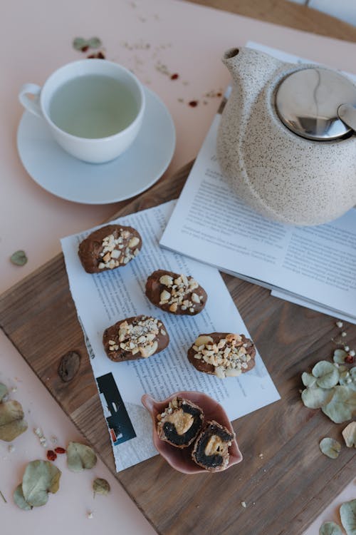 Free Green Tea and Cookies on a Pastel Table Stock Photo