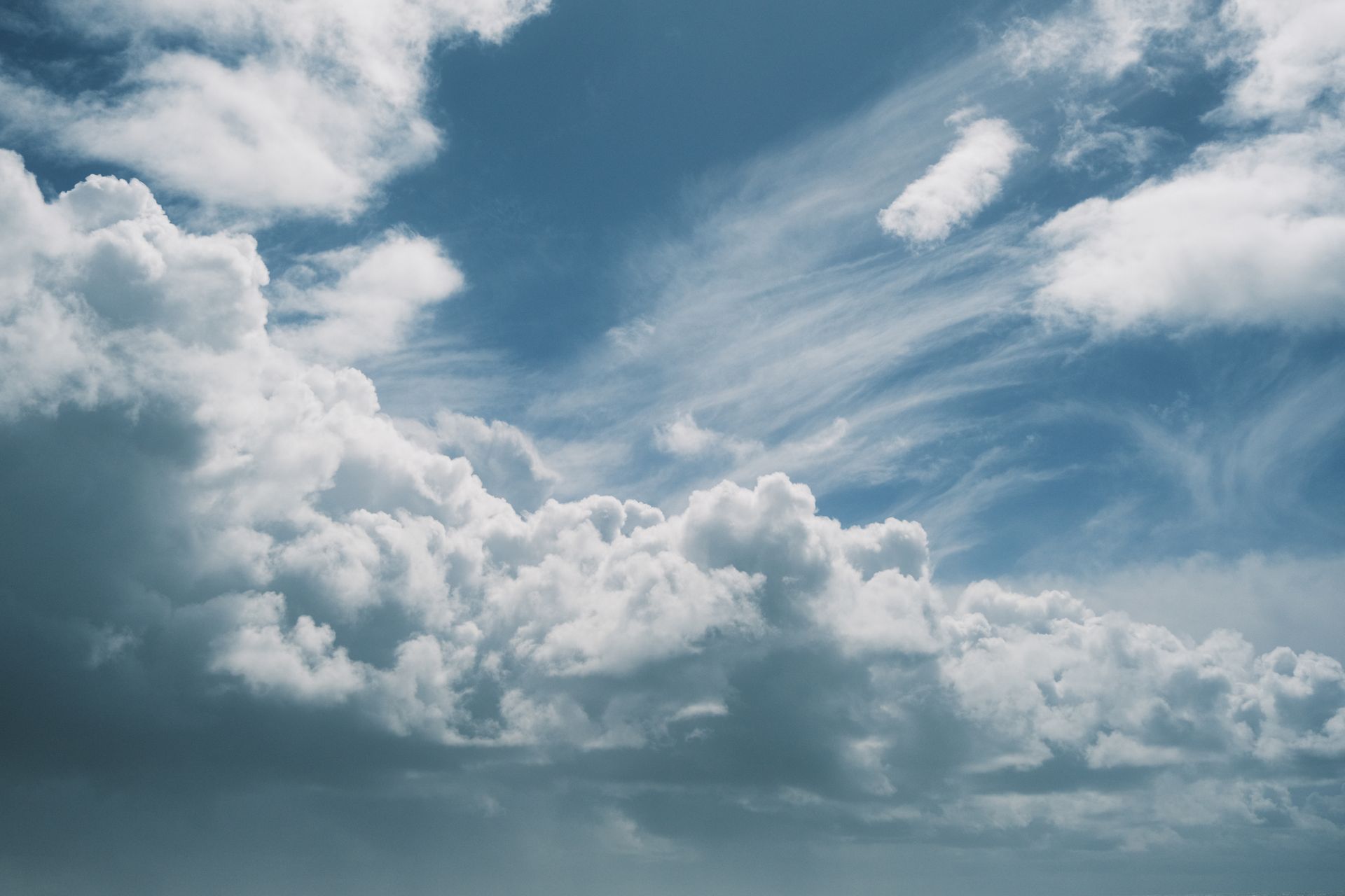 Moody sky with cumulus and cirrus clouds over Arcozelo, showcasing natural beauty.