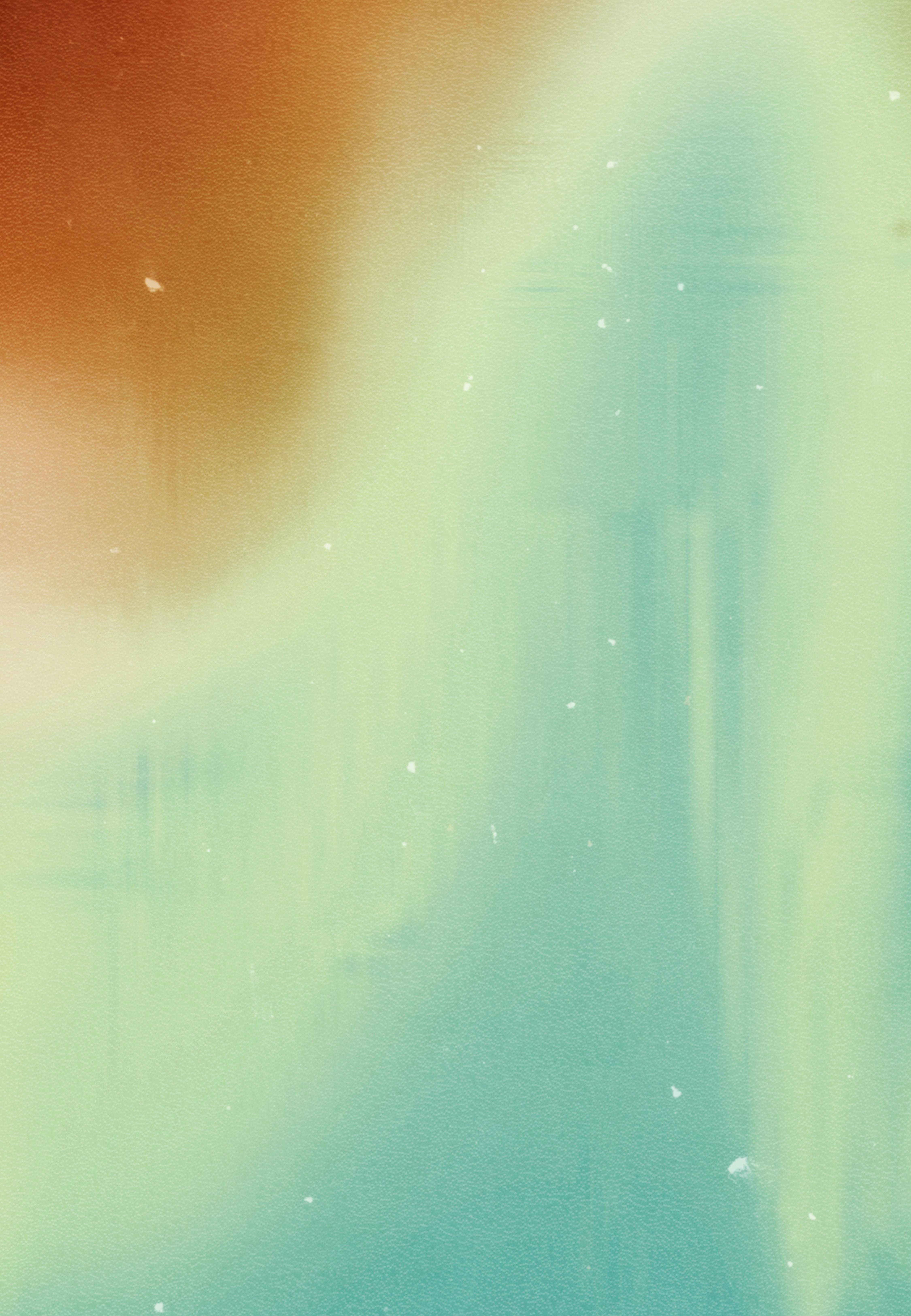 An artistic blend of blue and green gradient with abstract patterns and subtle textures.