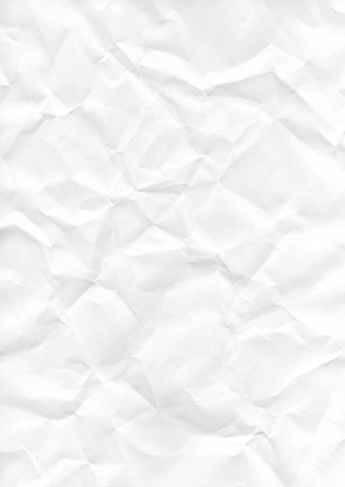 Free Crumpled white paper texture, perfect for backgrounds and design elements. Stock Photo