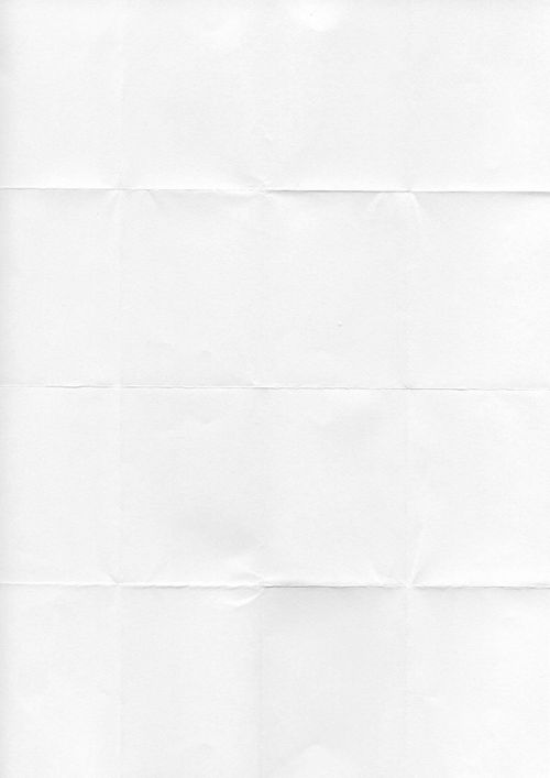 Free High-resolution image of a plain white paper texture with visible folds, perfect for backgrounds. Stock Photo