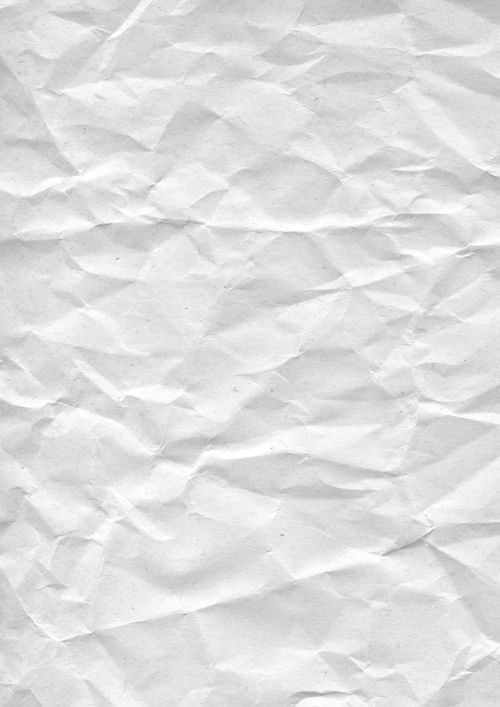 Free High-resolution image of crumpled white paper ideal for design and text overlay. Stock Photo