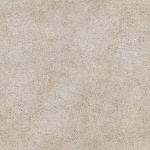 A beige background with some light gray stains