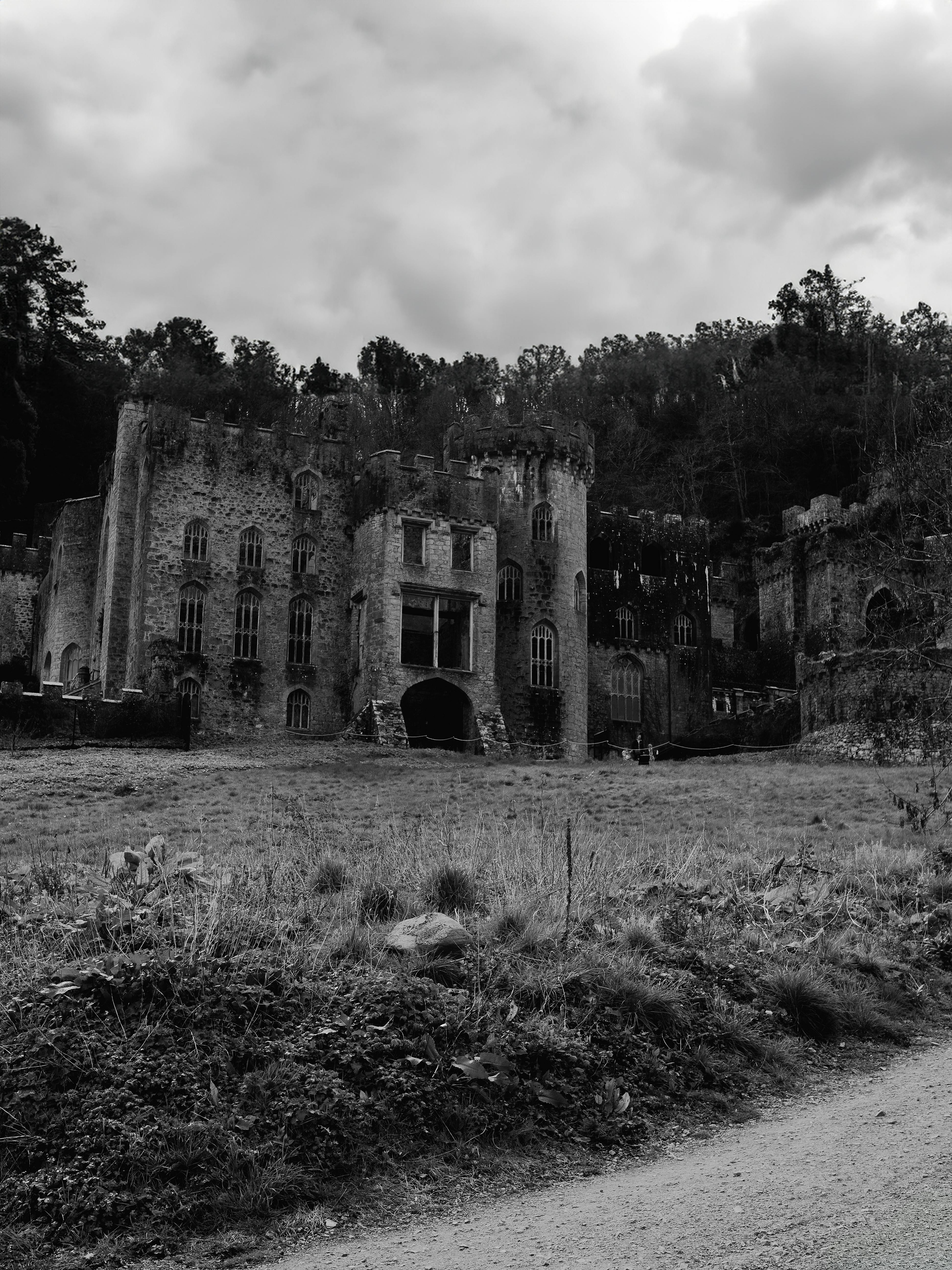 Black and white photo of Gwrych Castle ruins in Abergele, Wales.