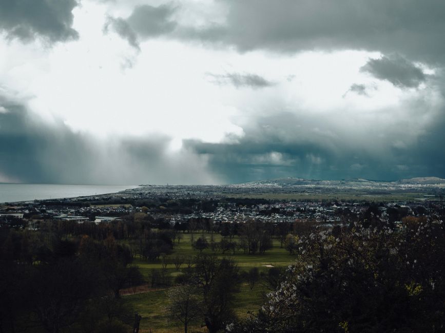 Captivating aerial view of Abergele, Wales under a dramatic overcast sky.