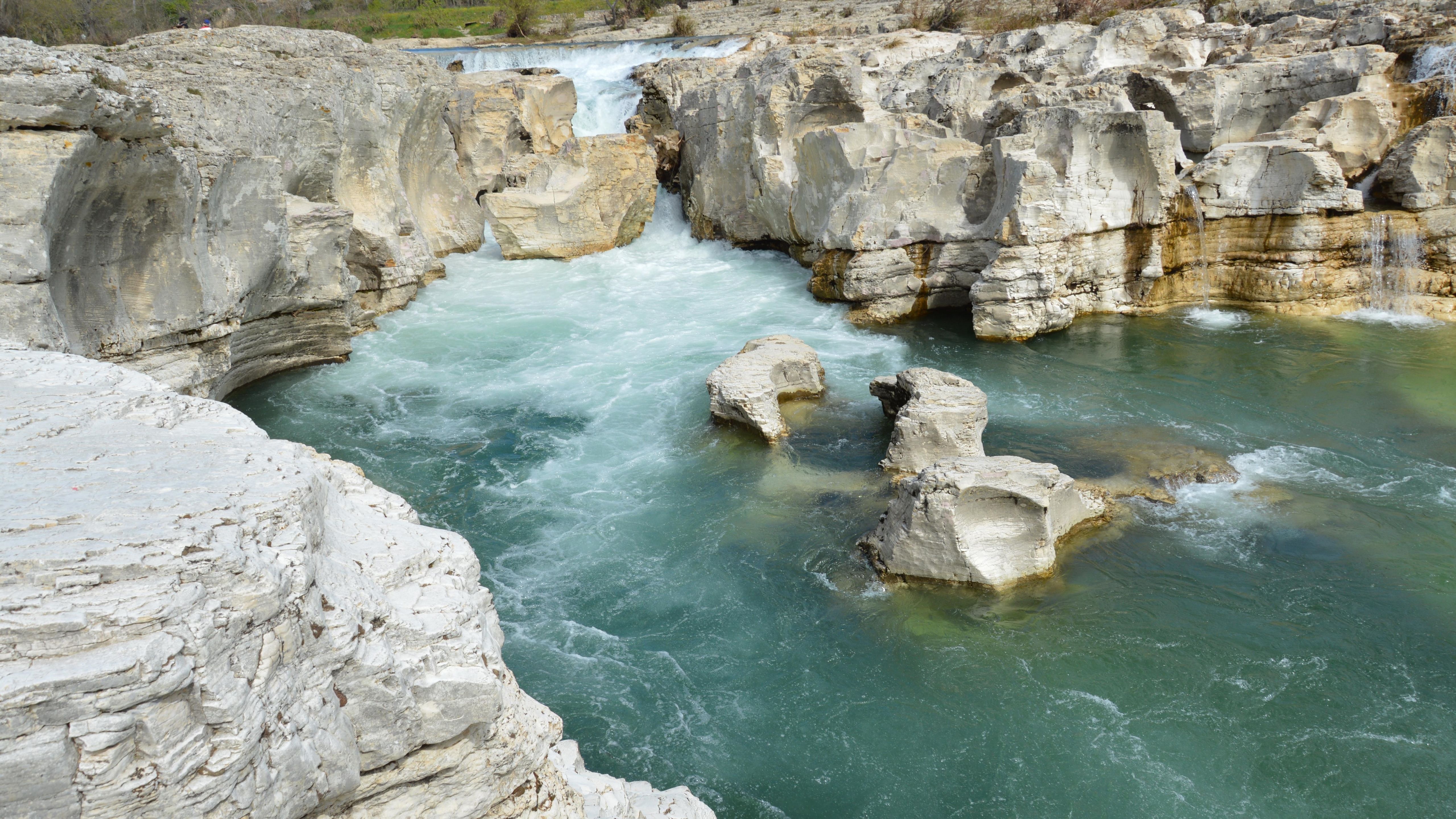 A river with white rocks and green water · Free Stock Photo