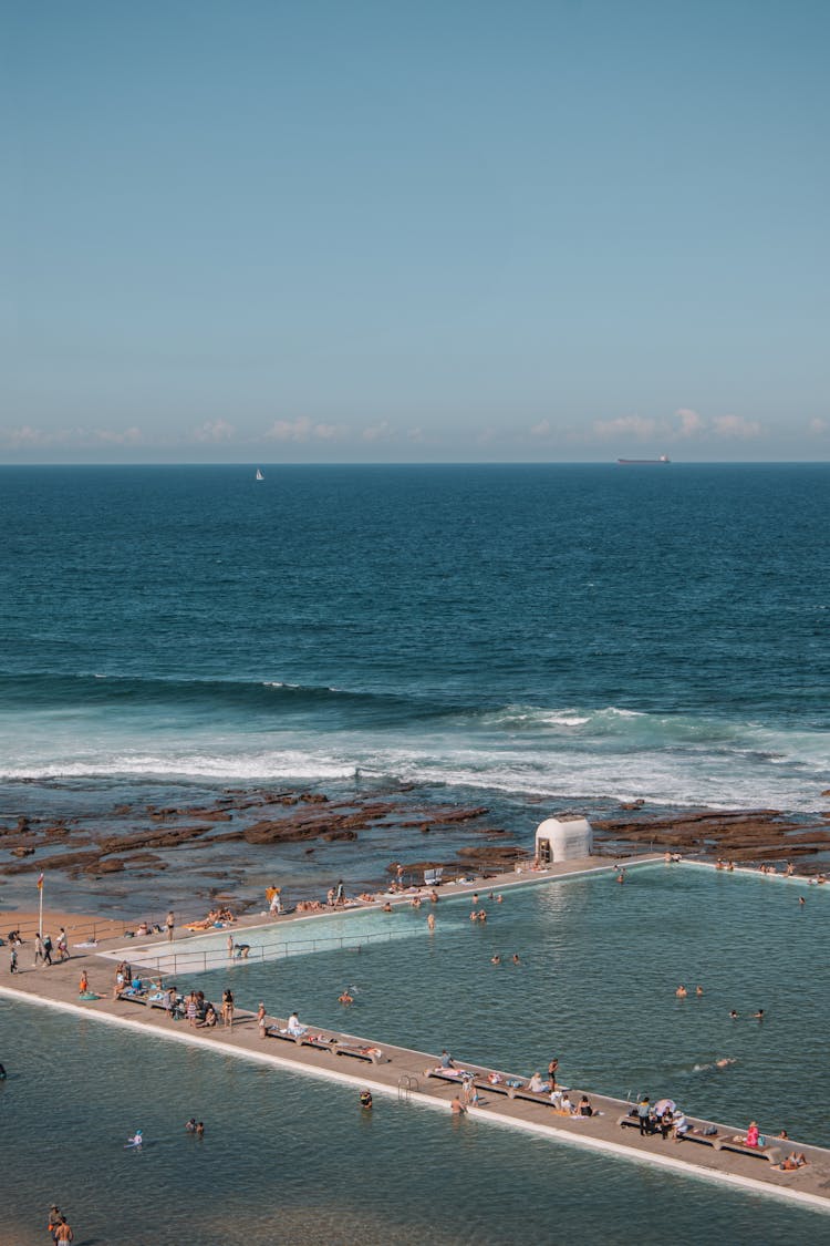 People On Pier On Sea Coast