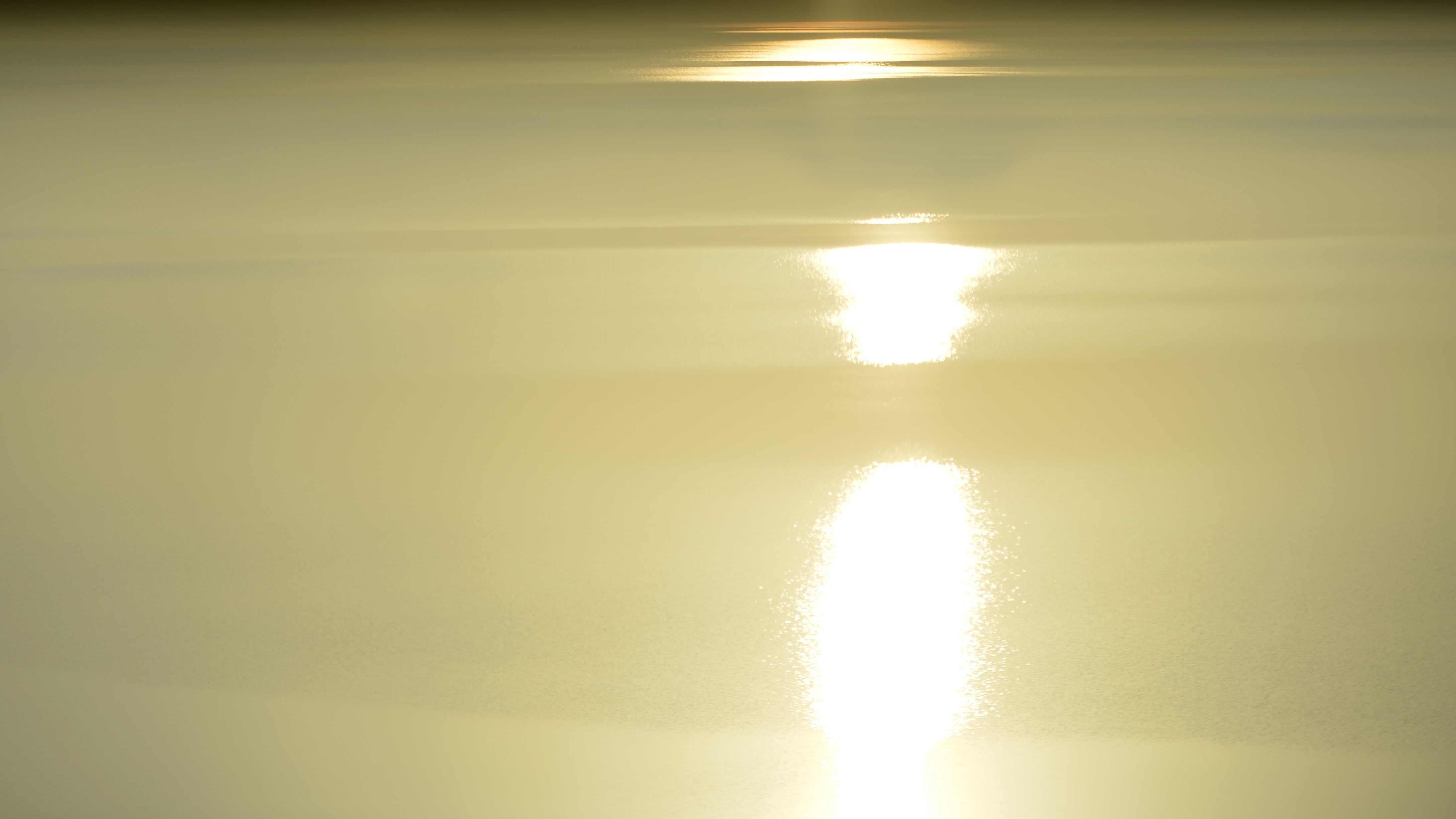 Surface of the Lake Reflecting the Setting Sun · Free Stock Photo