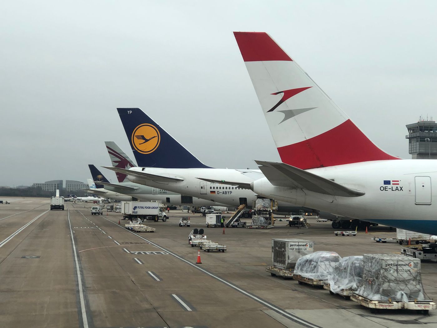 Aircraft parked at gates at Washington Dulles on a cloudy day