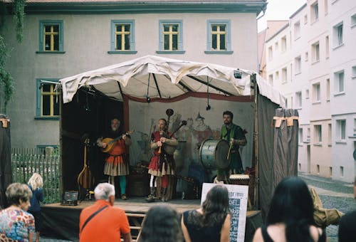 A group of people are performing on a stage