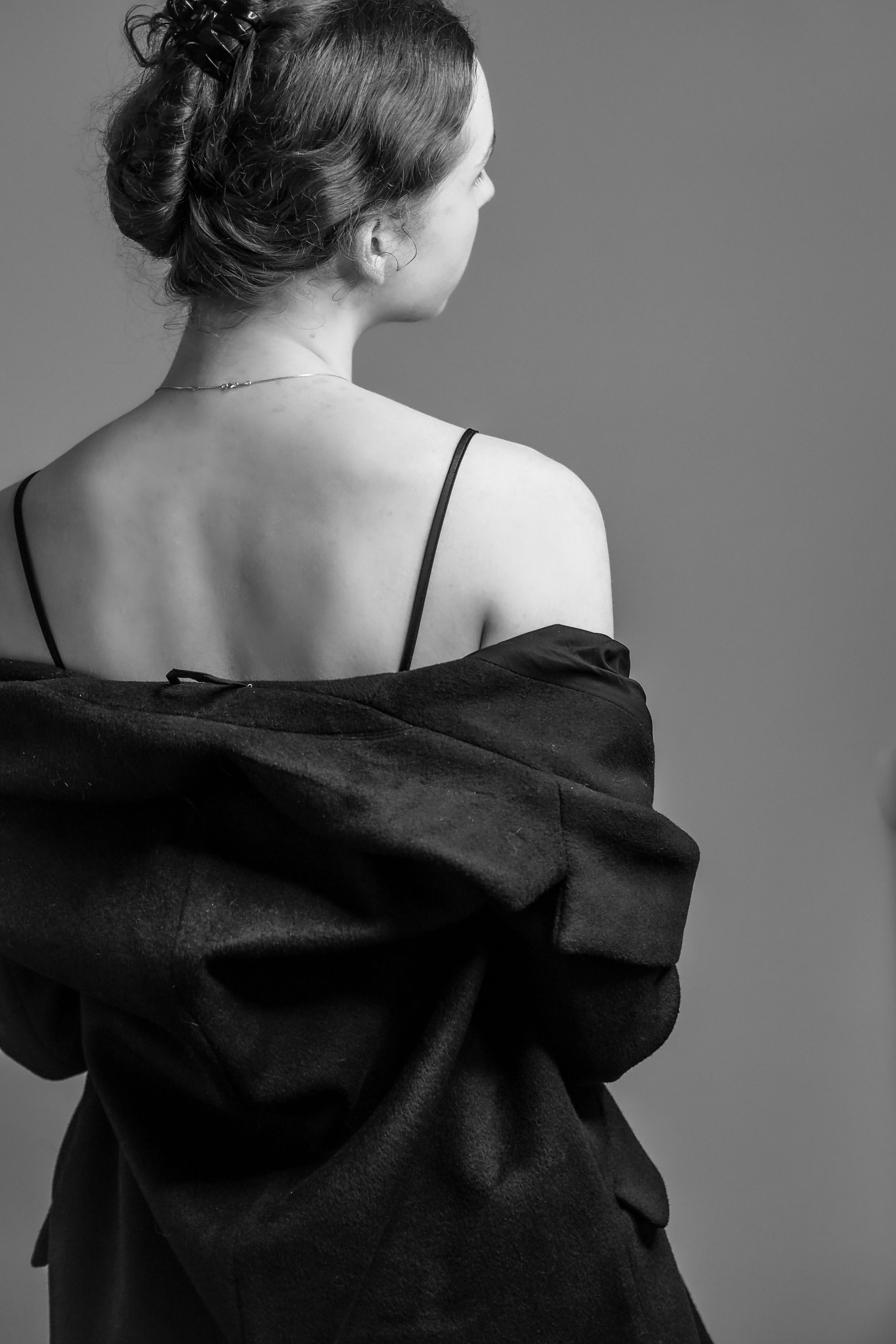 Back View of Woman in Coat in Black and White · Free Stock Photo