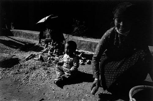 A black and white photo of a woman and child