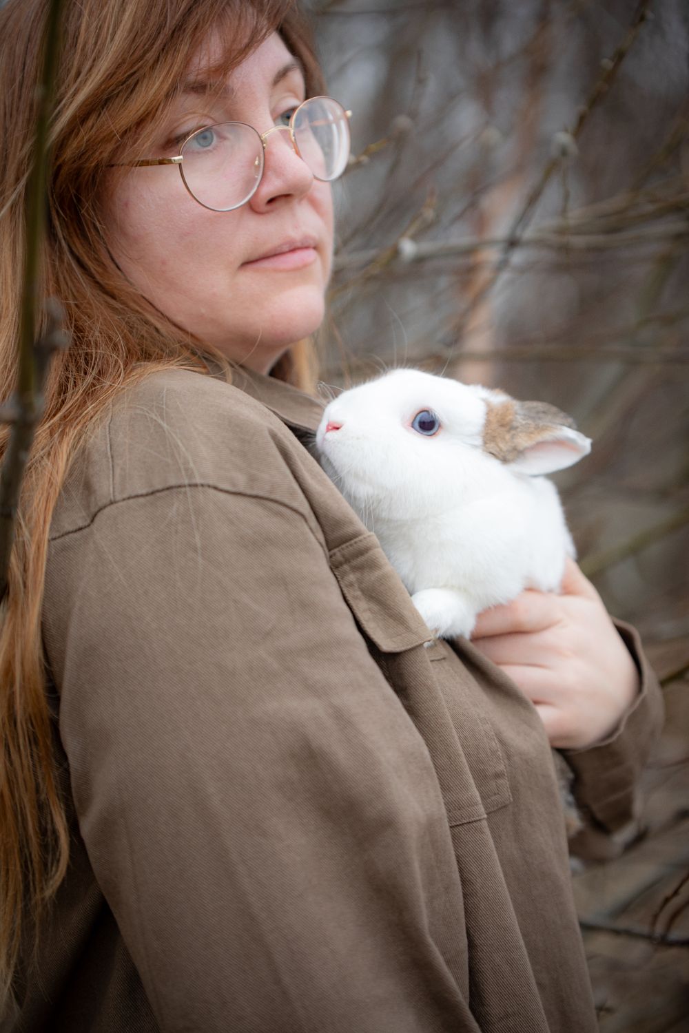 White Rabbit Woman Woman with a White Pet Rabbit in Her Arms · Free Stock Photo