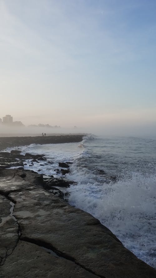 Rocky Seashore on a Foggy Morning