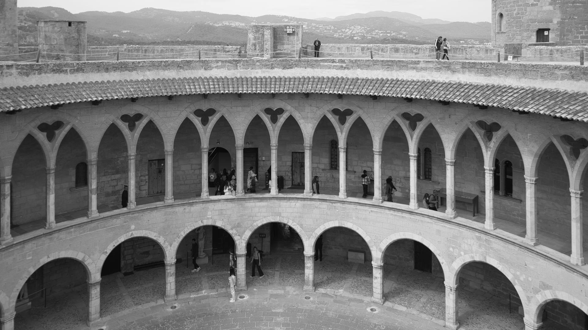 Visitors in the Courtyard of Castell de Bellver in Palma Spain
