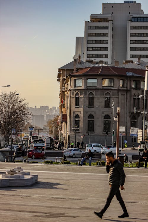 Pedestrian on Pavement in City