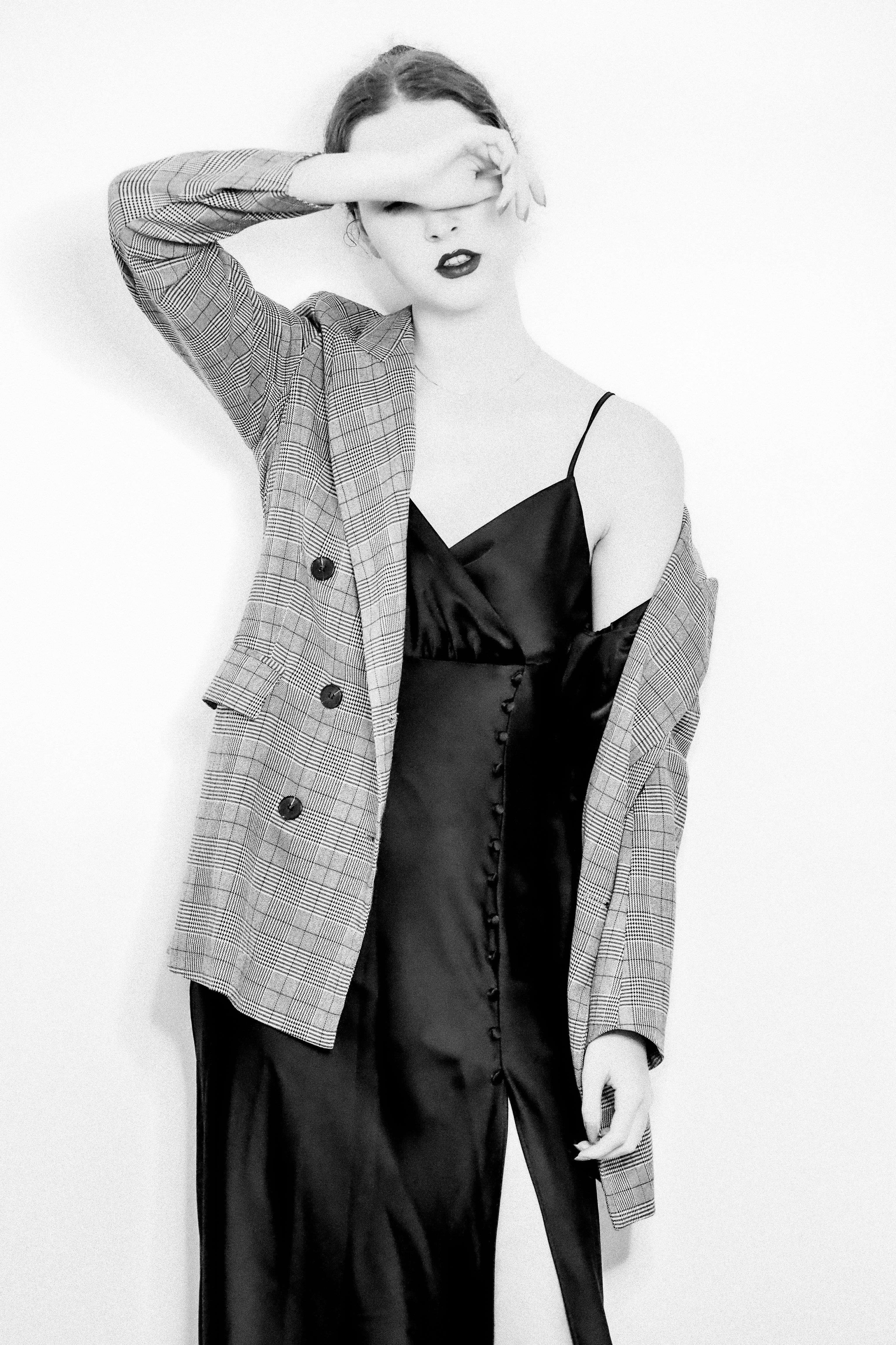 Woman in slip dress with oversized blazer