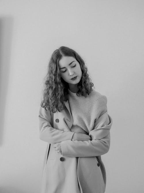 Portrait of Woman Wearing Trench Coat in Black and White 