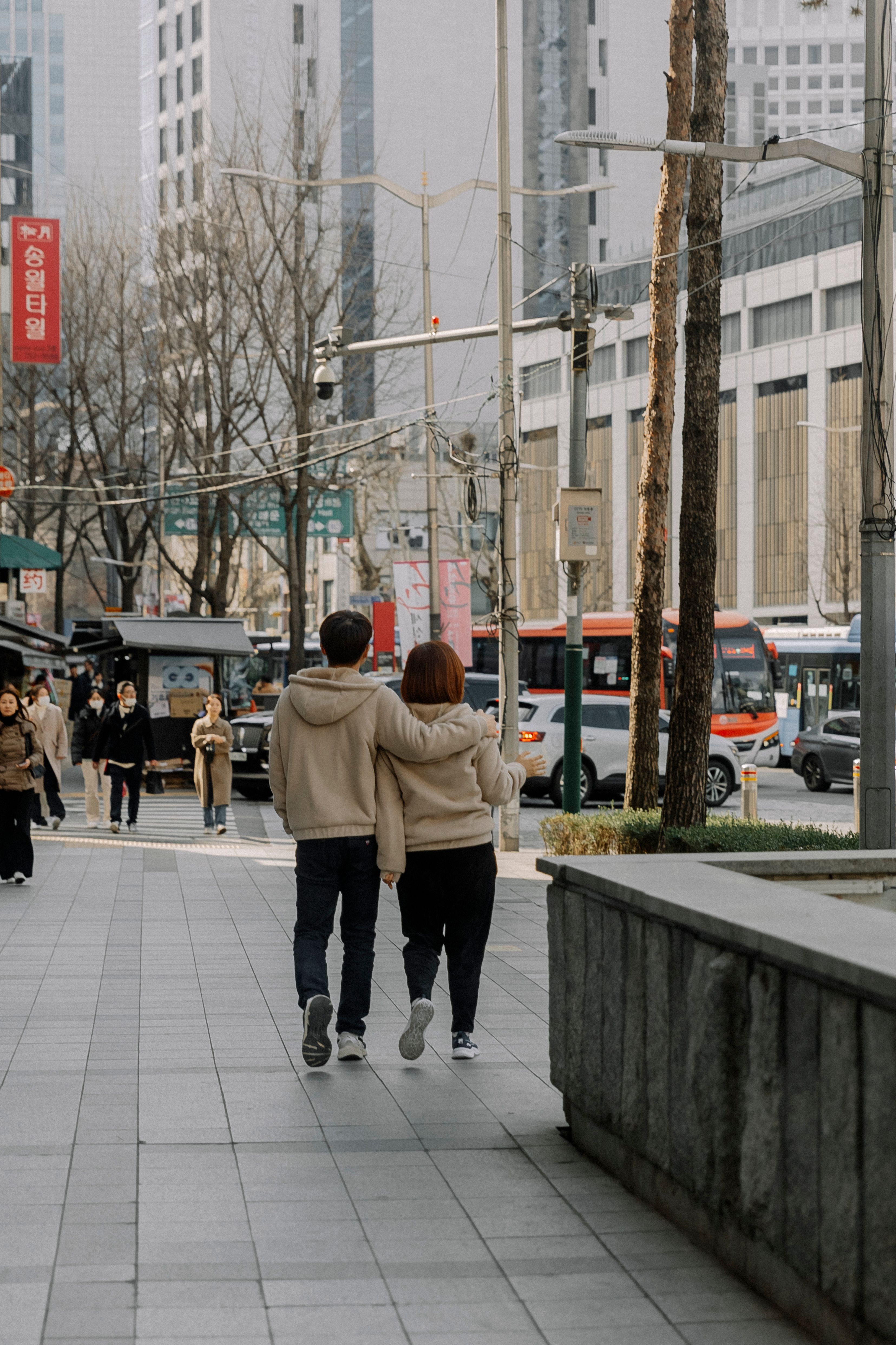 Couple on Pavement in City · Free Stock Photo