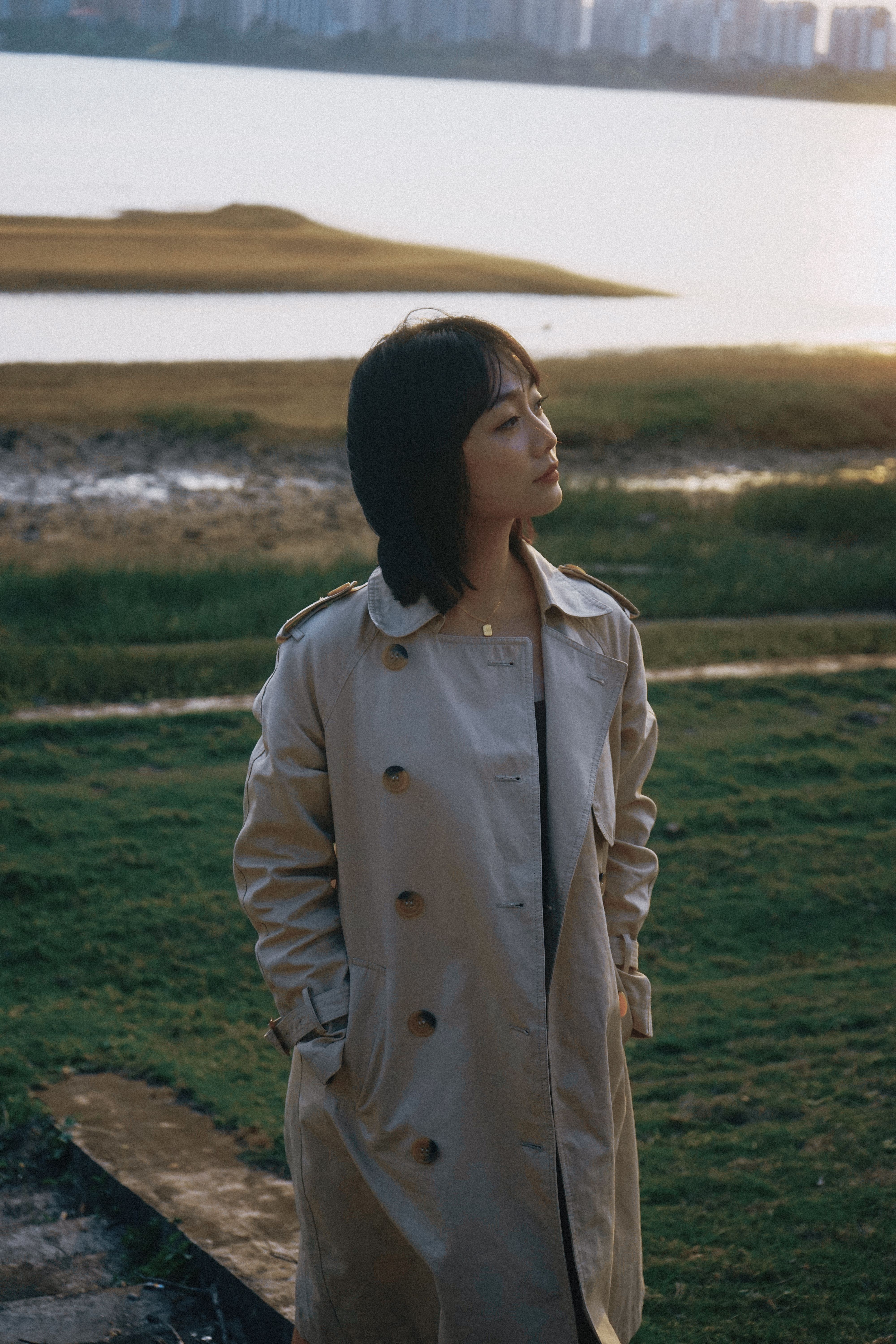Woman Wearing Trench Coat by the Lake · Free Stock Photo
