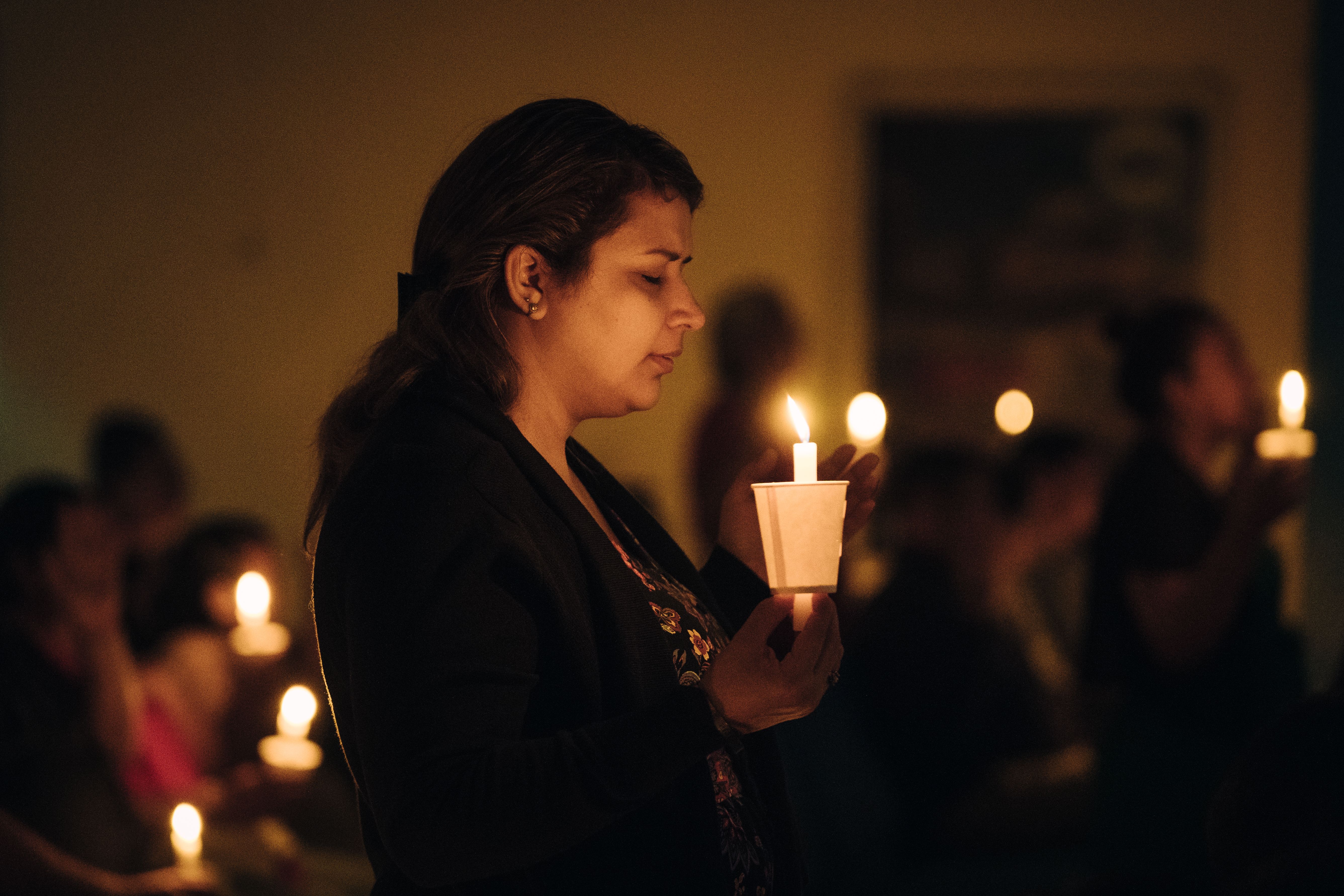 People with Candles in a Church · Free Stock Photo