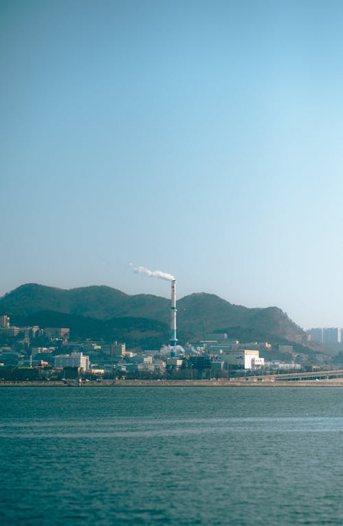 A view of a city with a large building in the background