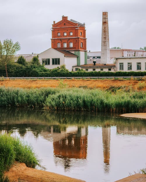 A photo of a factory and a river