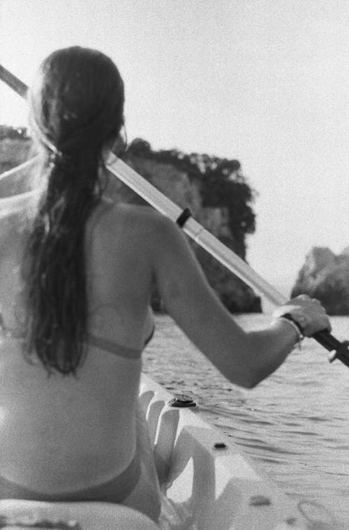 Woman Holding an Oar in Black and White 