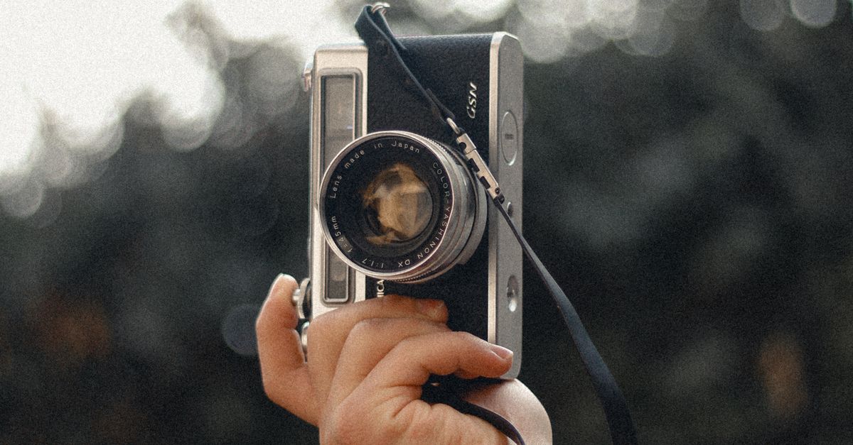 Hand With Camera Hand Holding Camera · Free Stock Photo