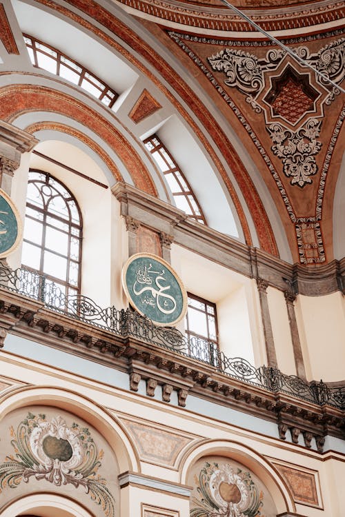 The interior of a building with ornate ceilings