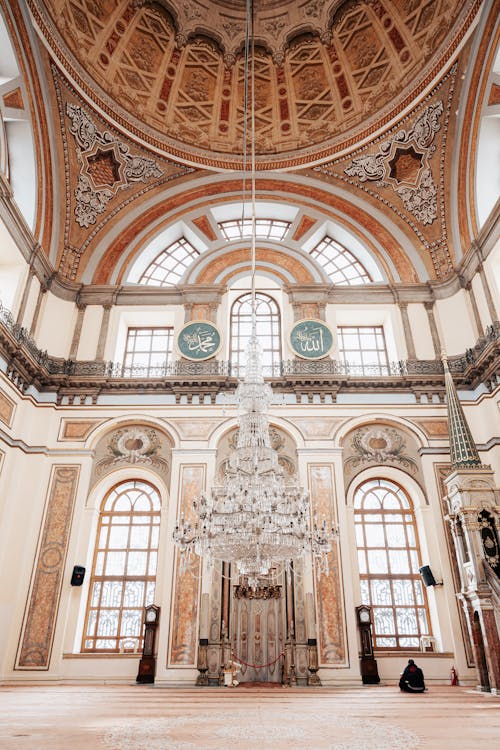 The interior of a large building with a chandelier