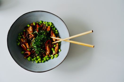 Delicious noodle dish with edamame and herbs, perfect for healthy meals.