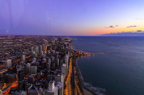 City Light By The Sea During Sunset