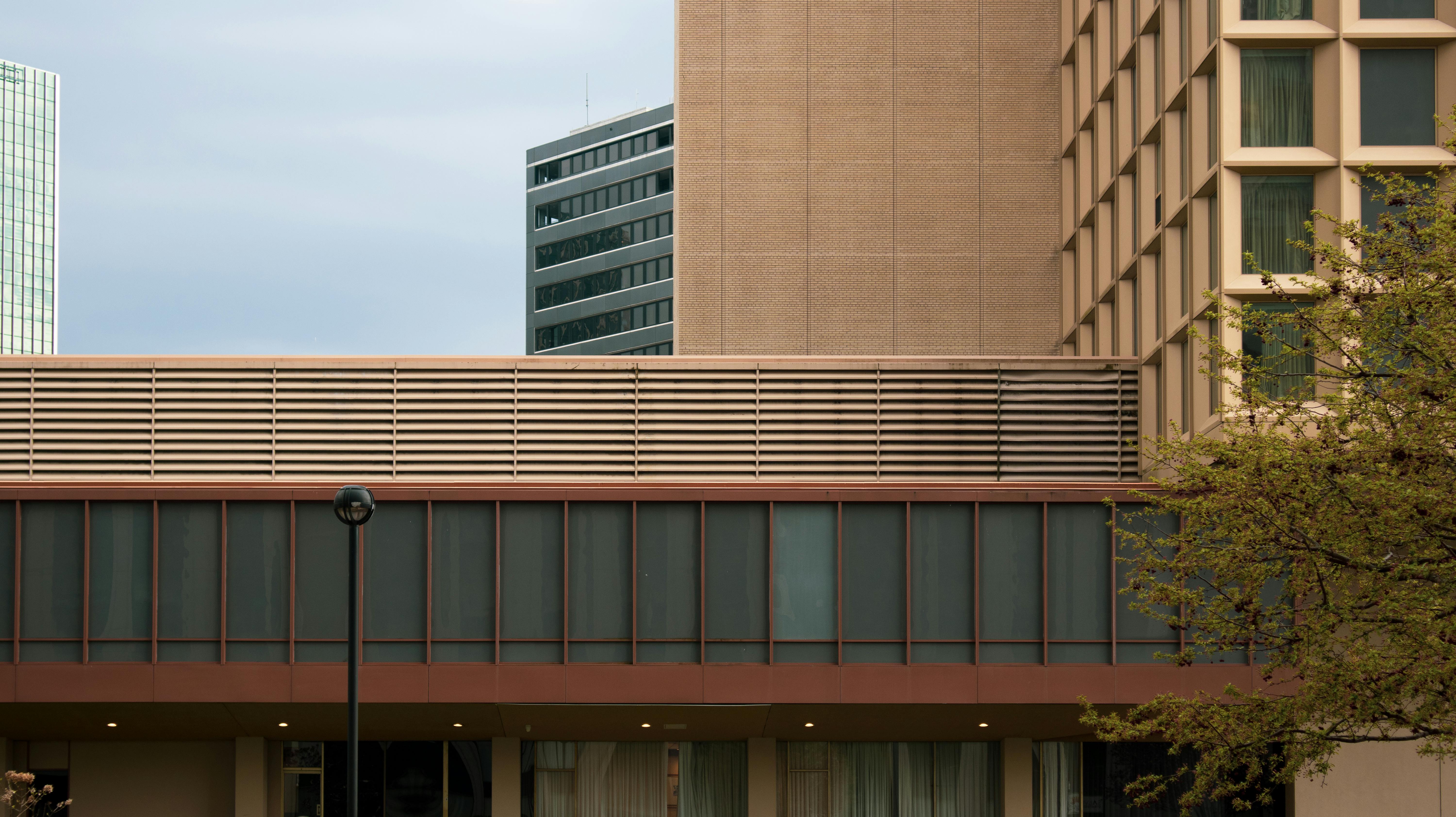 Free Facade of a modern building in downtown Pittsburgh, illustrating urban design elements. Stock Photo