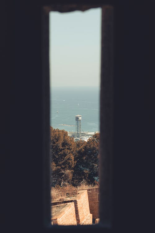 A view of the ocean through a window