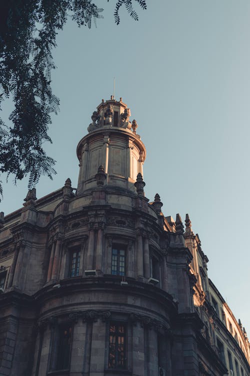 A tall building with a clock on top