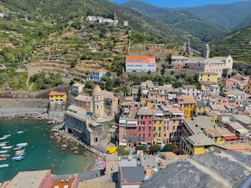 The view from the top of a hill overlooking a town