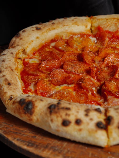 Pizza Served in a Restaurant 