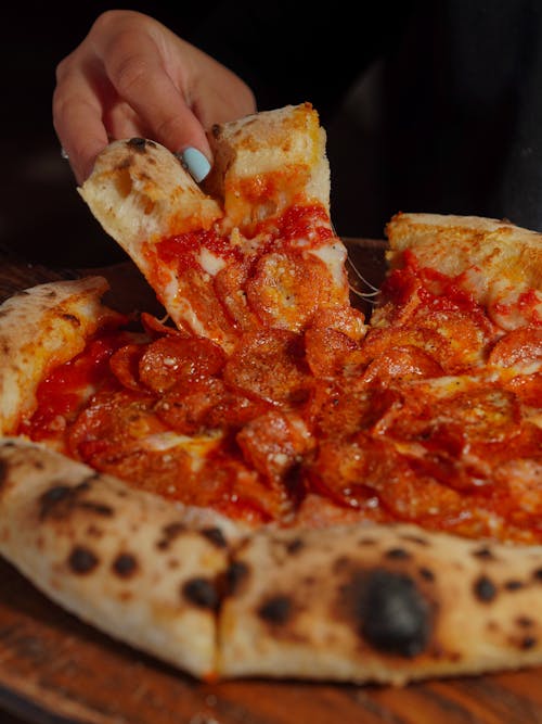 Pizza Served in a Restaurant 