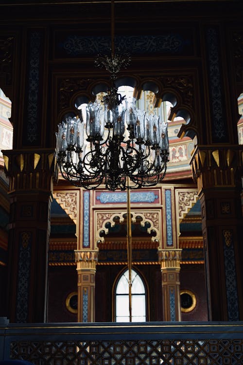 A chandelier hanging from the ceiling in a building