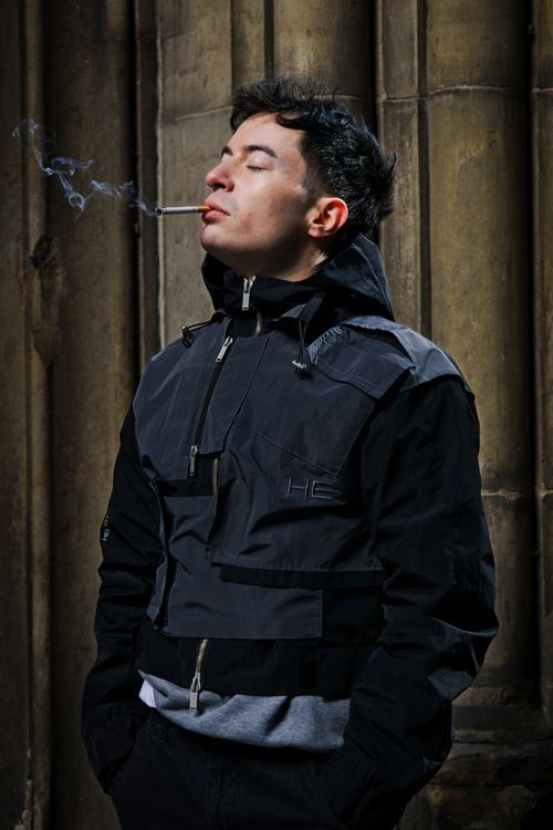 Guard Smoking Cigarette in Dark · Free Stock Photo