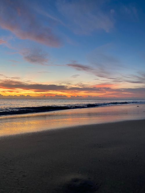 Free Capture the breathtaking beauty of a sunrise over a serene beach in Bahia, Brazil. Stock Photo