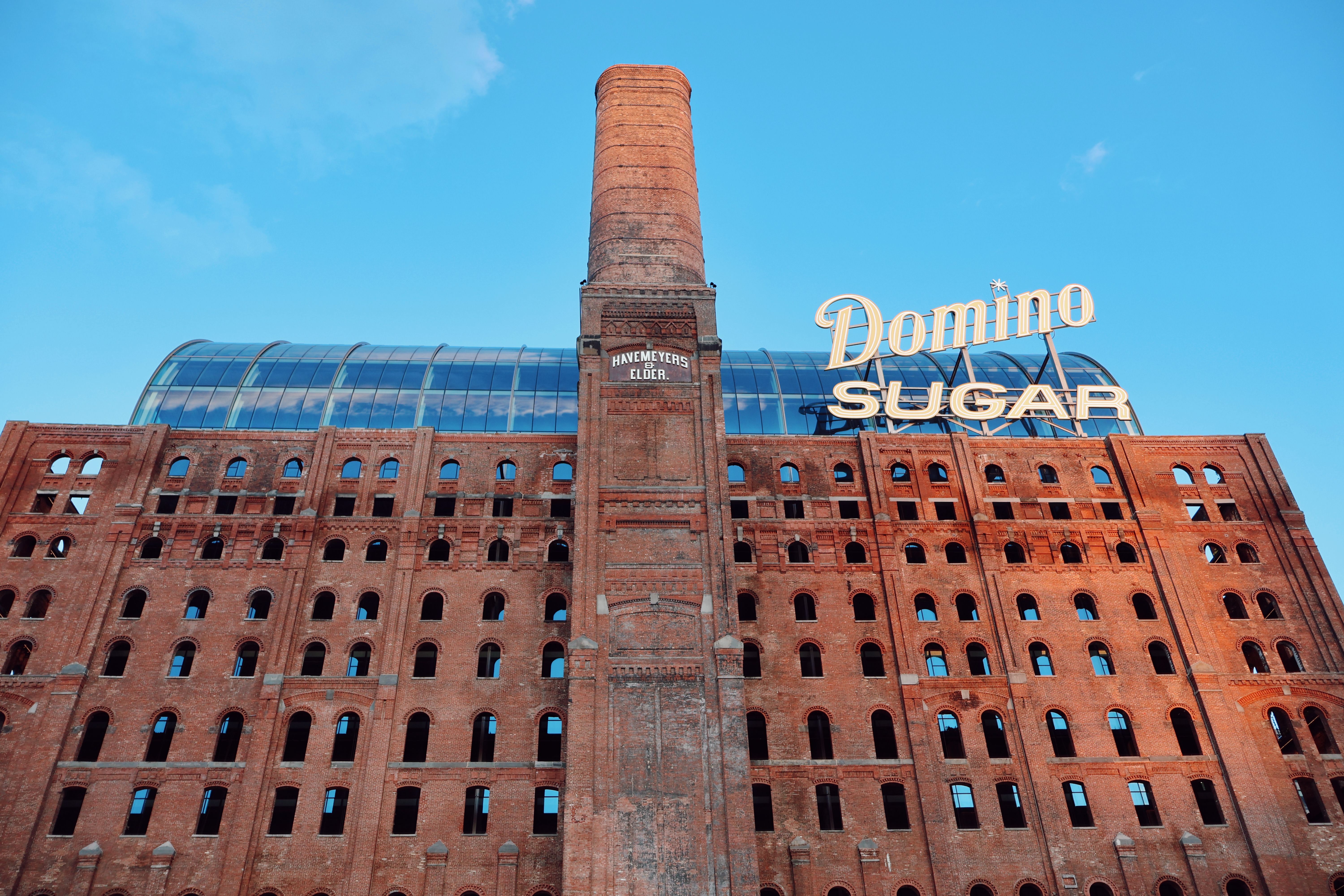 The Domino Sugar Factory in Williamsburg, a symbol of NYC's tech hub evolution - nyc async vibe jobs