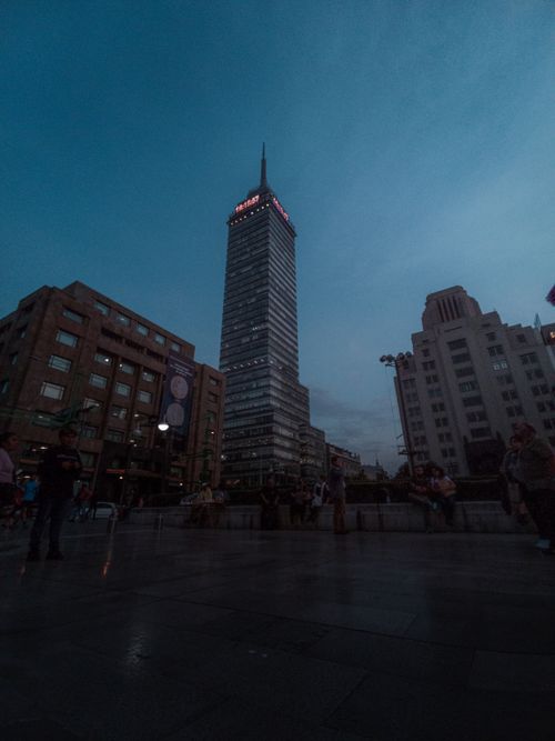 Free Torre Latinoamericana skyscraper at night, a prominent landmark in Mexico City. Stock Photo