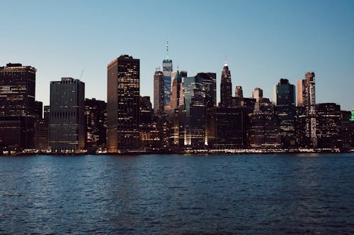 Free A view of the city skyline at dusk Stock Photo