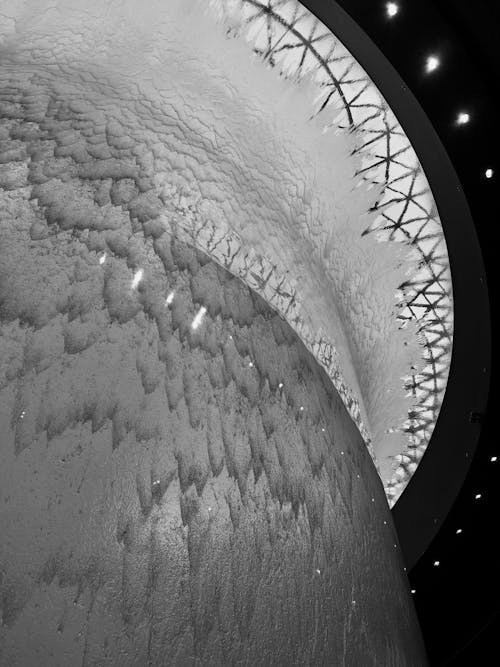 A black and white photo of a large dome