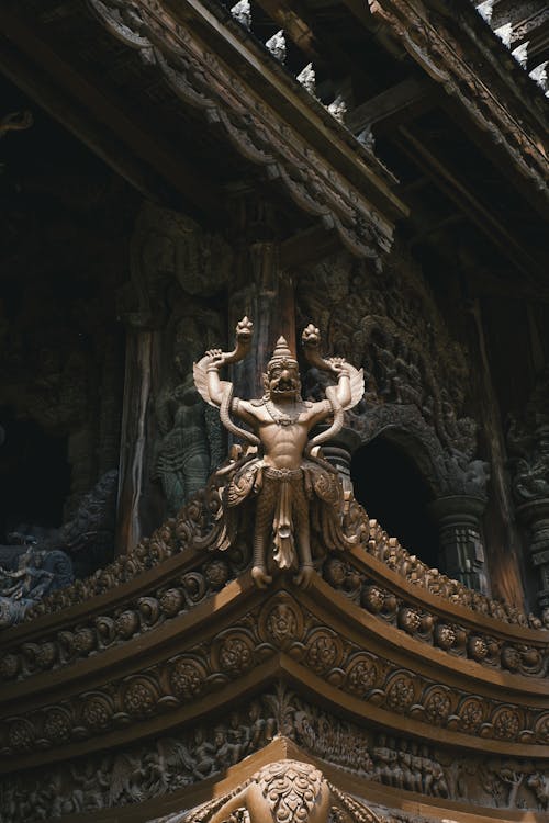 A statue on top of a wooden structure