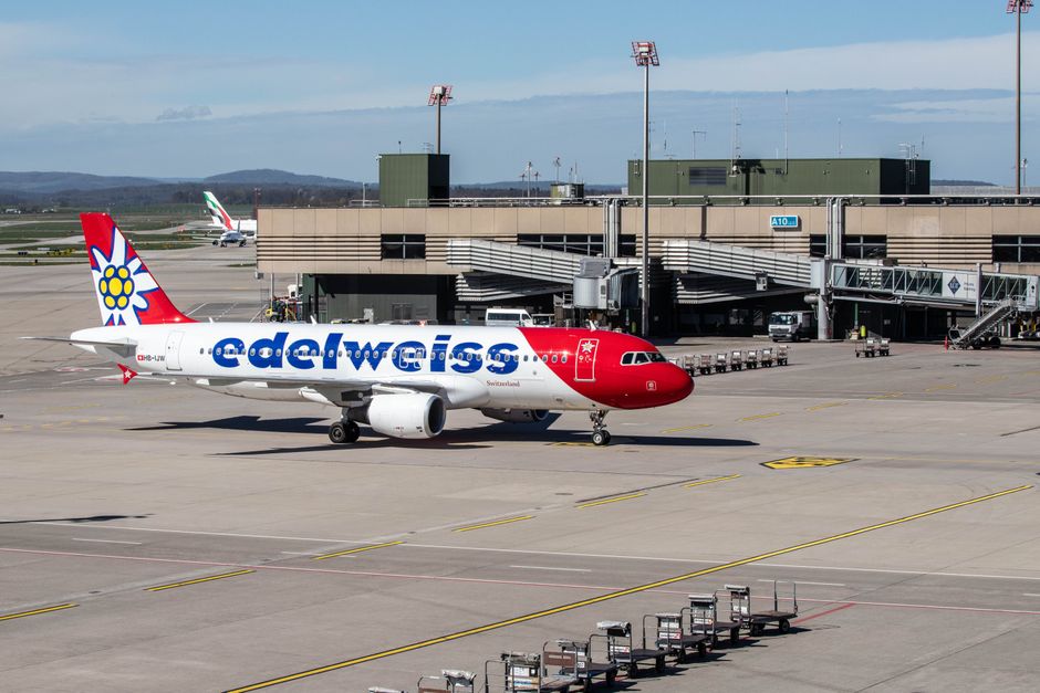 Swiss equities edge up as SMI hits 14,400; Zurich Airport slumps 7.7%