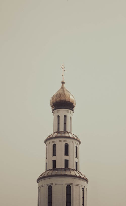 A church with a gold dome on top
