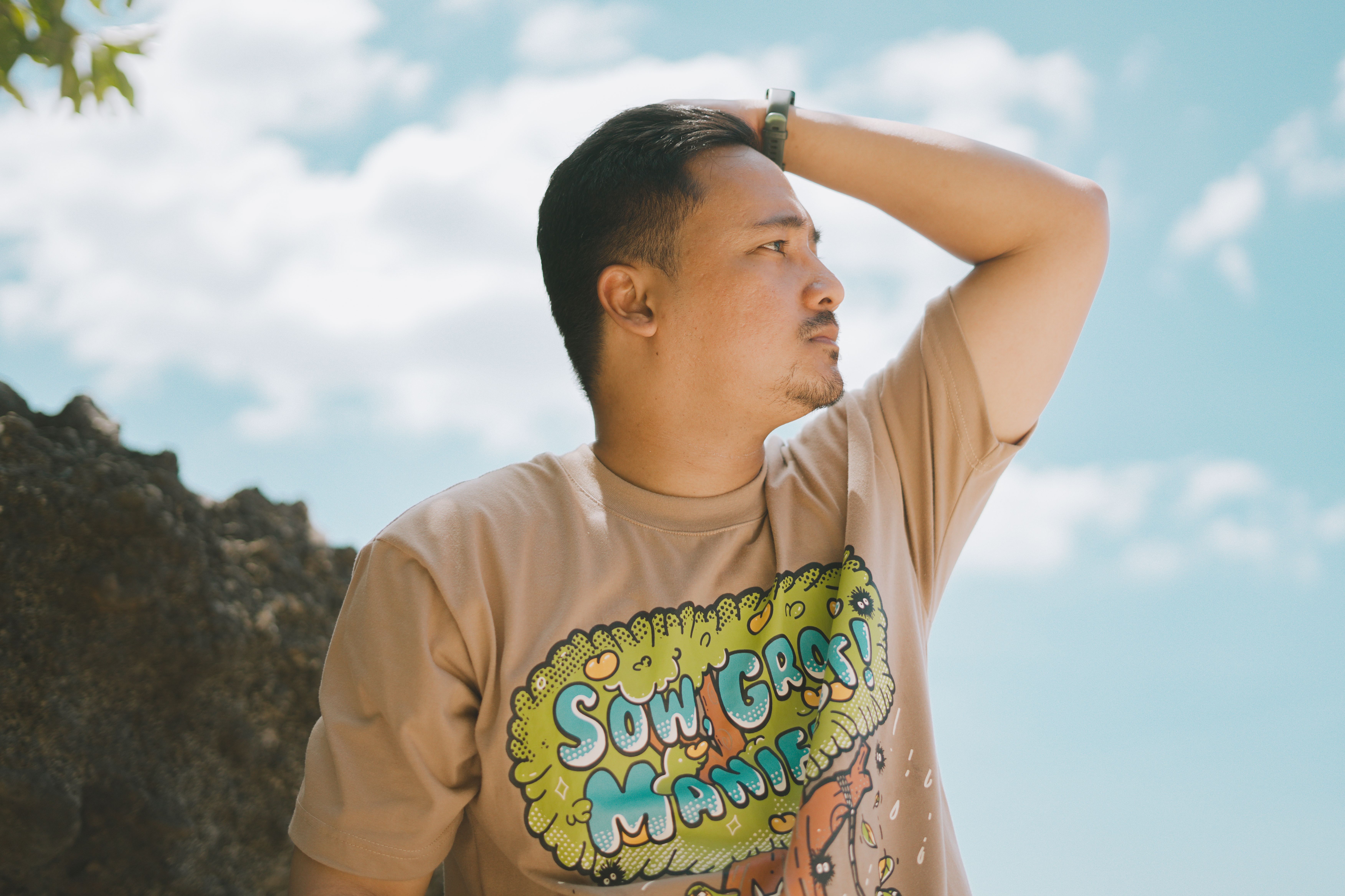 Portrait of a man enjoying a sunny day in Bolinao, Philippines.